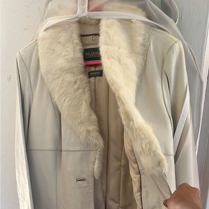 Leather coat with fur collar